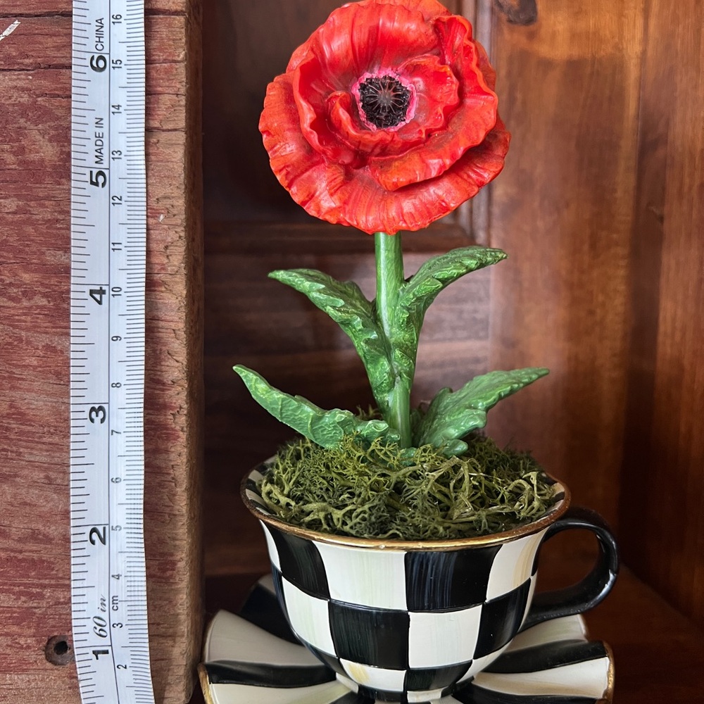 Red and Green Floral Accent in Checkered Cup
